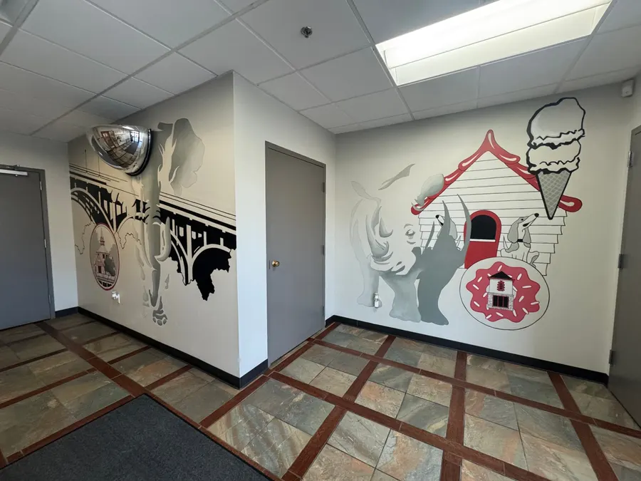 Hallway murals of neighborhood landmarks